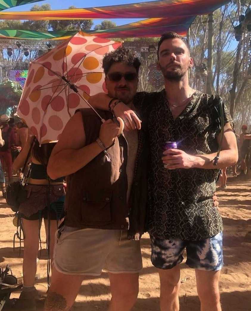 Lewis and friend at music festival