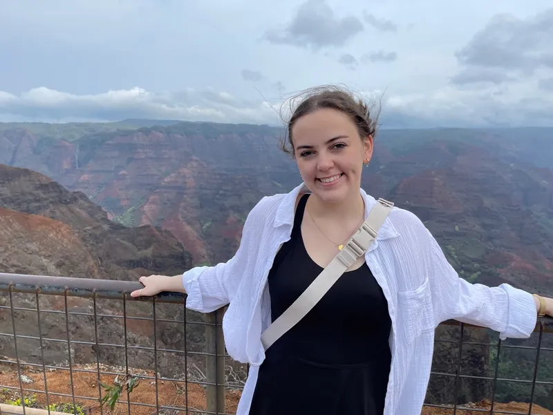 Isabelle at a cliff-top lookout