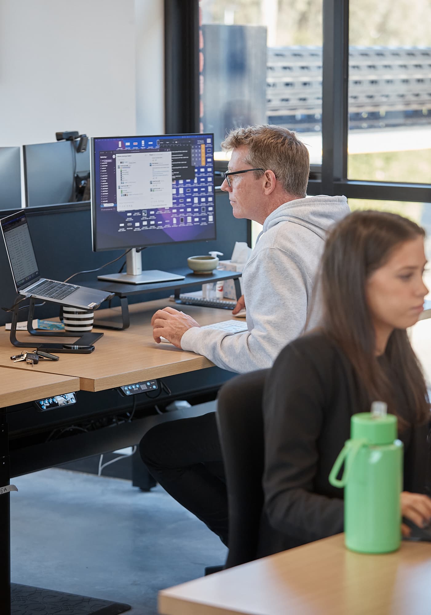 Optimising team member Dan working at desk