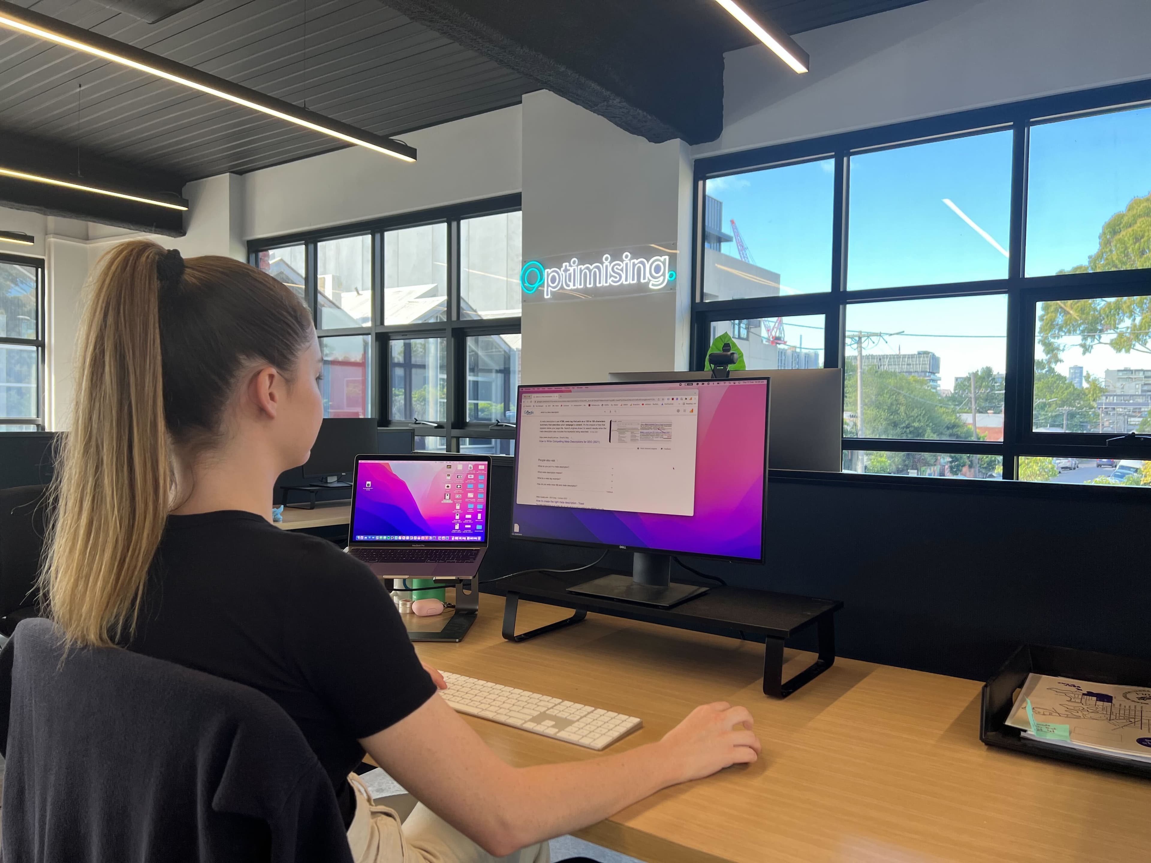 optimising employee working at her desk